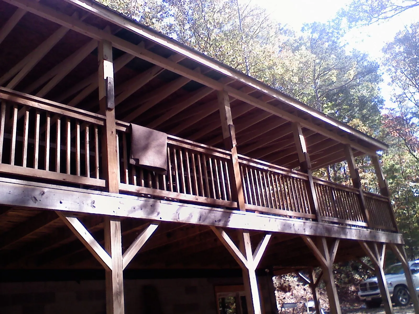 Timber framing under a new elevated porch and deck — Roof Leak Repair in Berkley by Roofing Brothers